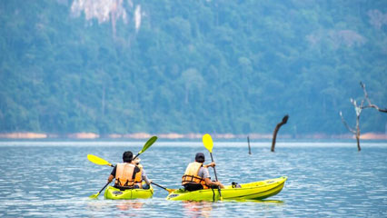 Kayaking on the way back from a stay with hilltribes in the Thailand countryside